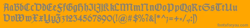 GotischcBold-Schriftart – Graue Schriften auf orangefarbenem Hintergrund