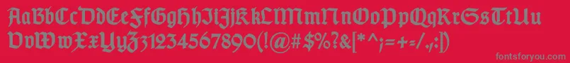 GotischcBold-fontti – harmaat kirjasimet punaisella taustalla