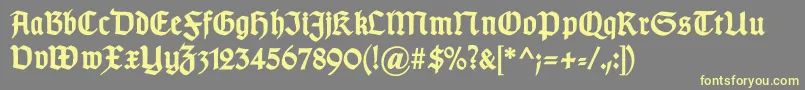 GotischcBold Font – Yellow Fonts on Gray Background