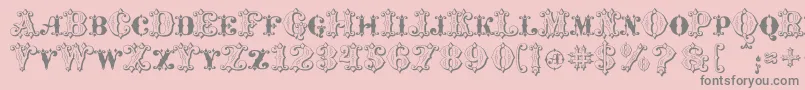 MavericksLuckKqs-Schriftart – Graue Schriften auf rosa Hintergrund