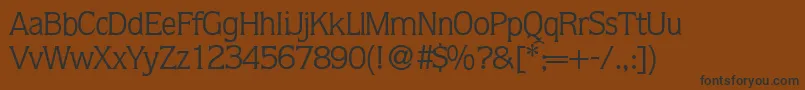 Q853FlareRegular-Schriftart – Schwarze Schriften auf braunem Hintergrund