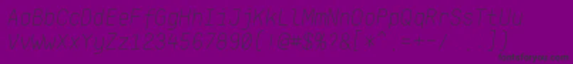 KlartextMonoThinItalic-fontti – mustat fontit violetilla taustalla