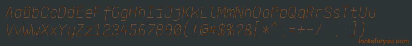 Шрифт KlartextMonoThinItalic – коричневые шрифты на чёрном фоне