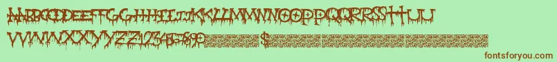 Gravepain Font – Brown Fonts on Green Background