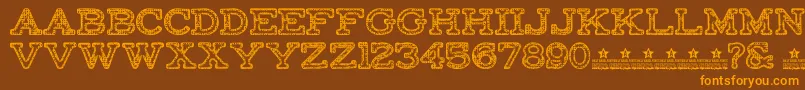 FactoryRegularPersonalUse Font – Orange Fonts on Brown Background