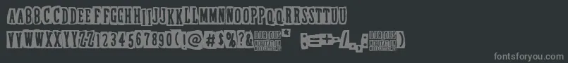 DubiousReputation-fontti – harmaat kirjasimet mustalla taustalla