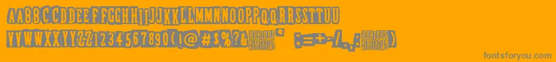 Czcionka DubiousReputation – szare czcionki na pomarańczowym tle