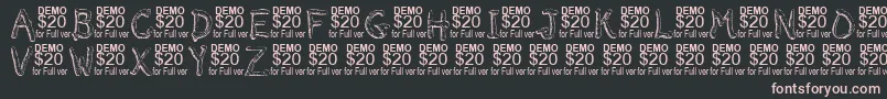 Smeltdemo Font – Pink Fonts on Black Background