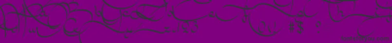 フォントAmalScript – 紫の背景に黒い文字