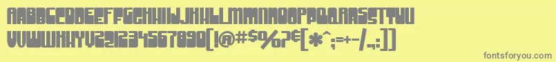 Fonte SfGrooveMachineUprightBold – fontes cinzas em um fundo amarelo