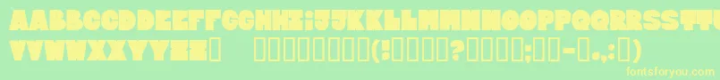 BloxxxxExtrabold Font – Yellow Fonts on Green Background