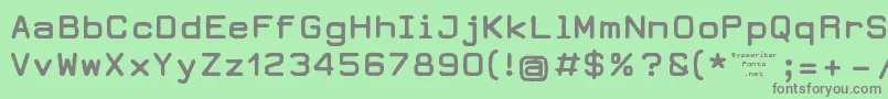DearbornType-fontti – harmaat kirjasimet vihreällä taustalla