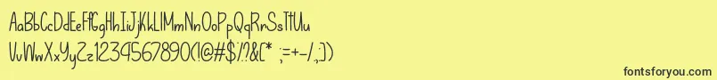 Czcionka LetThatBeEnoughOtf – czarne czcionki na żółtym tle