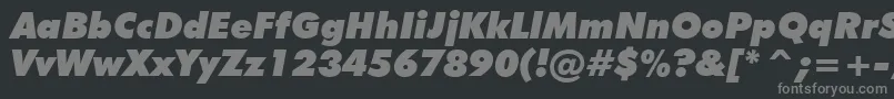 FuturaExtraBlackItalicBt-fontti – harmaat kirjasimet mustalla taustalla