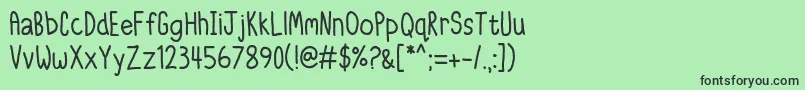 フォントIttyBittyNotebook – 緑の背景に黒い文字