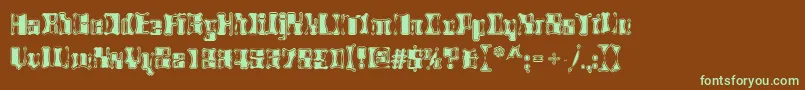 フォントAlienautopsy – 緑色の文字が茶色の背景にあります。