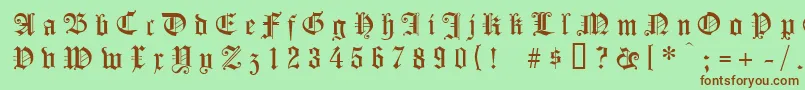 Шрифт Koenigsbergergesperrtunz1l – коричневые шрифты на зелёном фоне