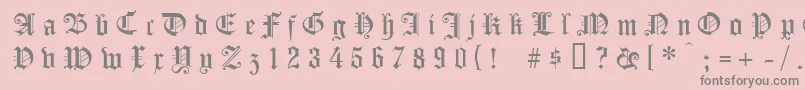 フォントKoenigsbergergesperrtunz1l – ピンクの背景に灰色の文字