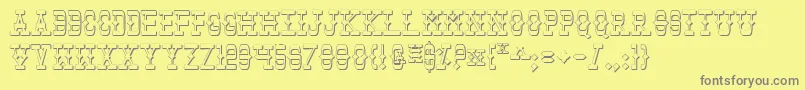 フォントTombv2s – 黄色の背景に灰色の文字