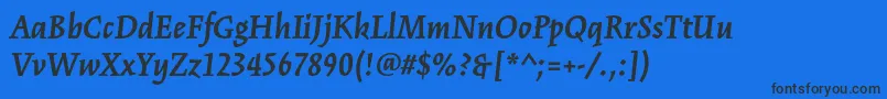 KinesisstdBolditalic Font – Black Fonts on Blue Background