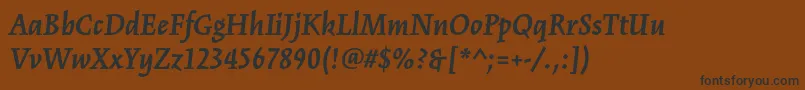 KinesisstdBolditalic Font – Black Fonts on Brown Background