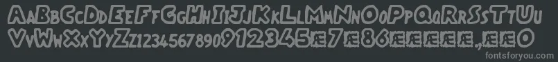 フォントVacantCapzBrk – 黒い背景に灰色の文字