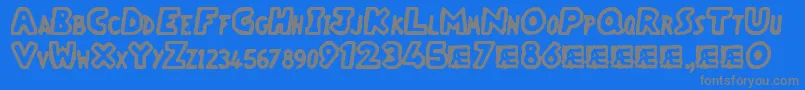 VacantCapzBrk Font – Gray Fonts on Blue Background