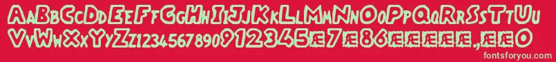 VacantCapzBrk Font – Green Fonts on Red Background