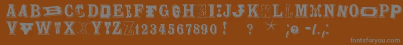 フォントWoodtypesmk – 茶色の背景に灰色の文字