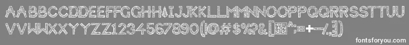 フォントHbmForistaWoodyPersonalUseOnly – 灰色の背景に白い文字