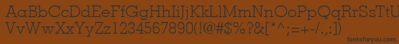 MemphisLtLight-fontti – mustat fontit ruskealla taustalla