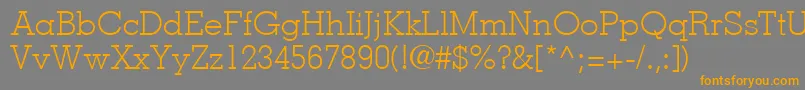 フォントMemphisLtLight – オレンジの文字は灰色の背景にあります。