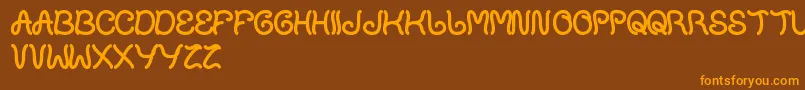 PlantOnLawn Font – Orange Fonts on Brown Background