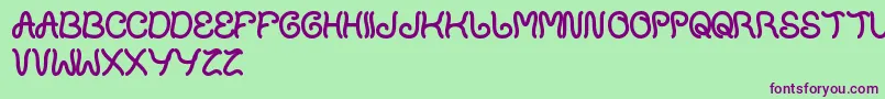 PlantOnLawn Font – Purple Fonts on Green Background