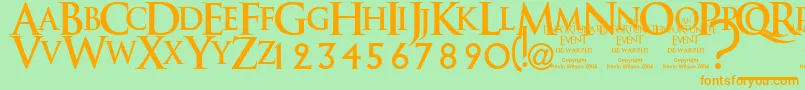 フォントAnunedw – オレンジの文字が緑の背景にあります。