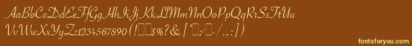 SavoyeLetPlain.1.0 Font – Yellow Fonts on Brown Background