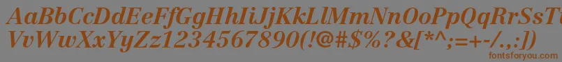 フォントCentennialltstdBolditalic – 茶色の文字が灰色の背景にあります。