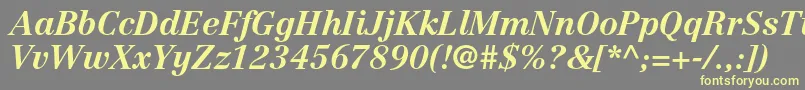 Шрифт CentennialltstdBolditalic – жёлтые шрифты на сером фоне