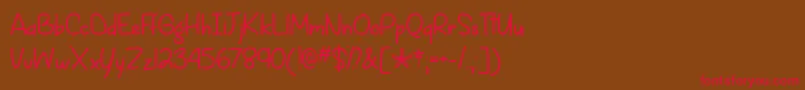 SpringIsComingOtf Font – Red Fonts on Brown Background