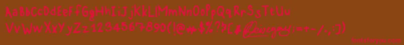 フォントKarz001 – 赤い文字が茶色の背景にあります。