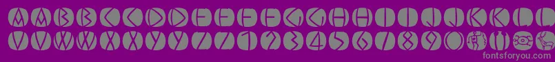 Oldgreekbuttons-fontti – harmaat kirjasimet violetilla taustalla