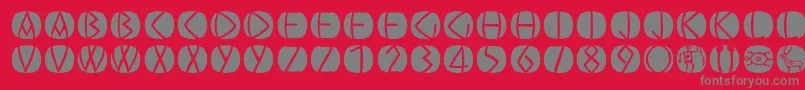 Czcionka Oldgreekbuttons – szare czcionki na czerwonym tle