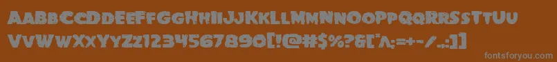 Goblincreekexpand-Schriftart – Graue Schriften auf braunem Hintergrund