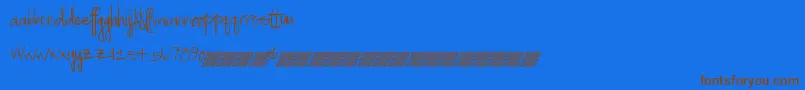 Greatspringtime-Schriftart – Braune Schriften auf blauem Hintergrund