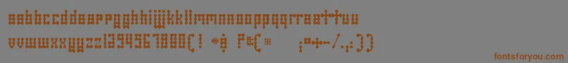 SkeletorStance-Schriftart – Braune Schriften auf grauem Hintergrund
