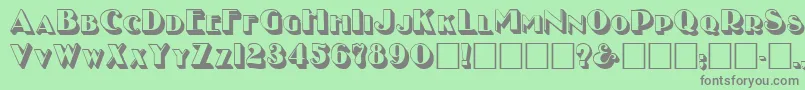 フォントNewYearMedium – 緑の背景に灰色の文字