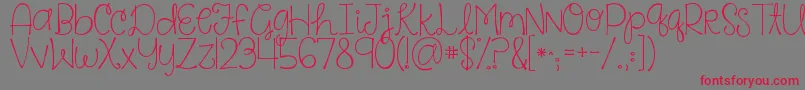 Kgsaysomething-Schriftart – Rote Schriften auf grauem Hintergrund