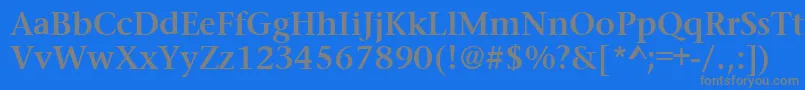 PrudentialBold-fontti – harmaat kirjasimet sinisellä taustalla
