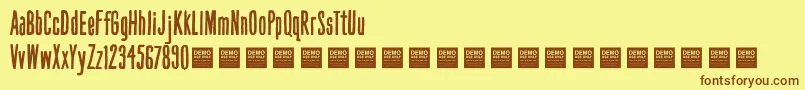 HandBookDemo Font – Brown Fonts on Yellow Background