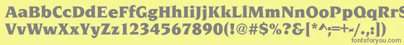 NavarroUltraRegular-fontti – harmaat kirjasimet keltaisella taustalla